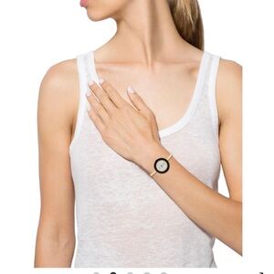 Gucci Women's Watch with Red Bezel and Gold Band